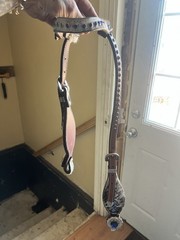 Western horse headstall featuring blue rhinestones and cowhide inlays