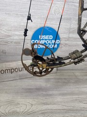 Used Bear Paradox 55-70# RH Real Tree Package