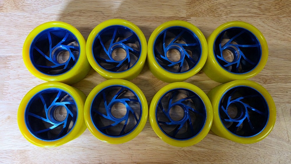 Roller Skate Wheels Yellow With Blue Aluminum Hub.