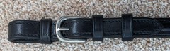 Bobby’s black leather flat English reins with hand stops and center buckle 54 in