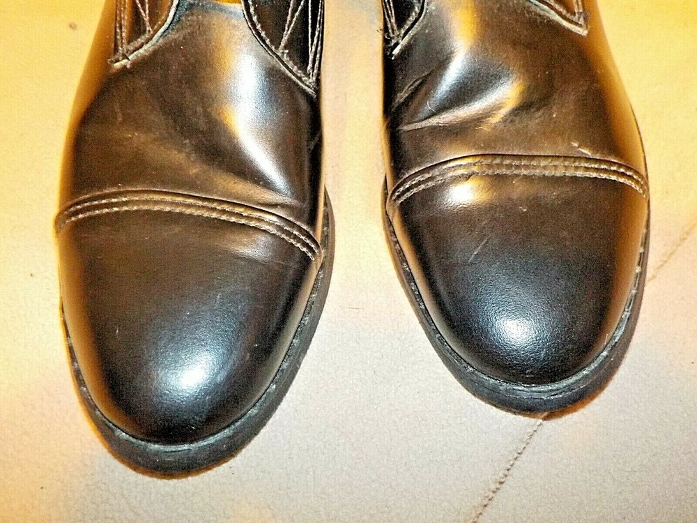 Her 7 1/2 B Black leather riding boots with laces & fancy toe, unused. Made USA