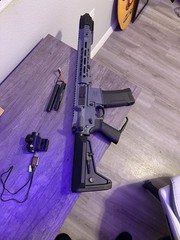 6mmproshop AEG rifle, 1 magazine, 1 red dot, battery and charger