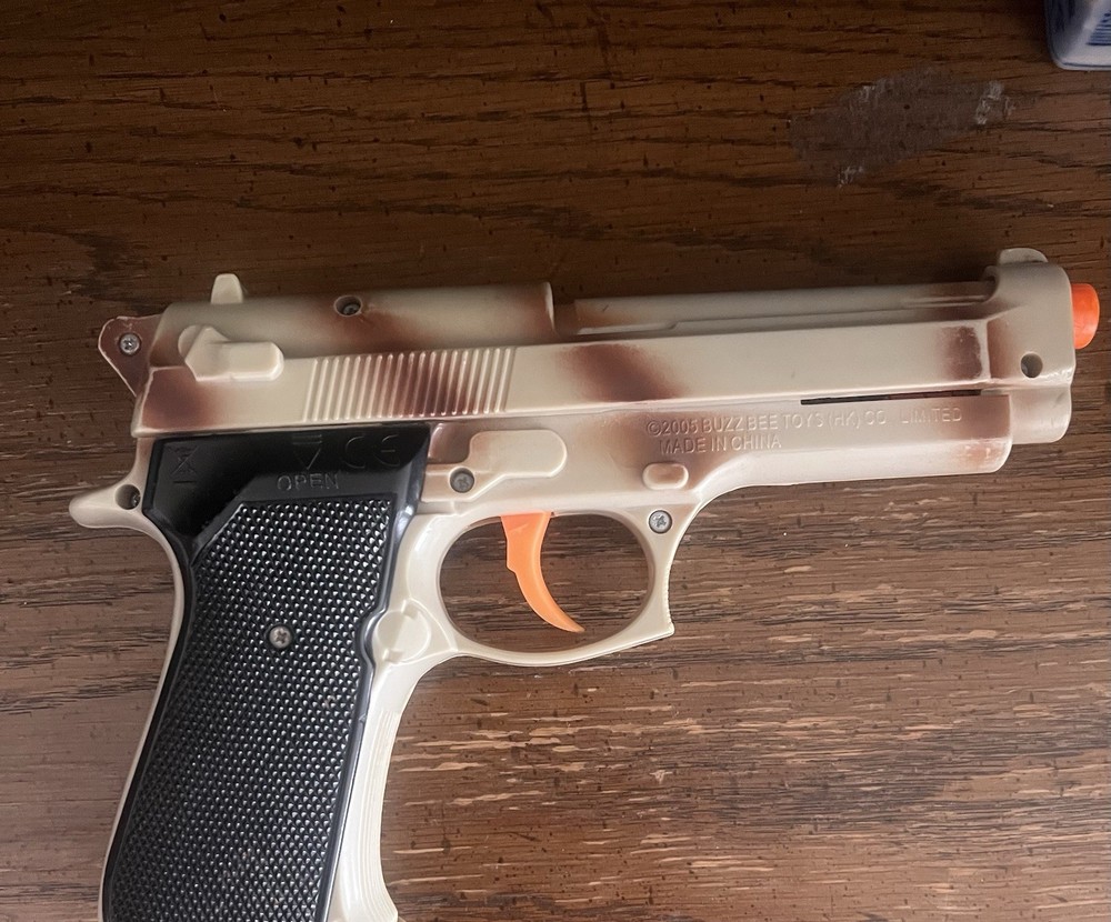 Buzz Bee Toys Spring Airsoft Pistol Tan Camouflage Black Grip Orange Tip