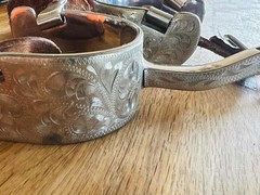 Showman brand Silver Woman’s Spurs fits size 7 boot – used but in good condition