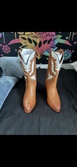 Tan and white leather Ralph Lauren boots.