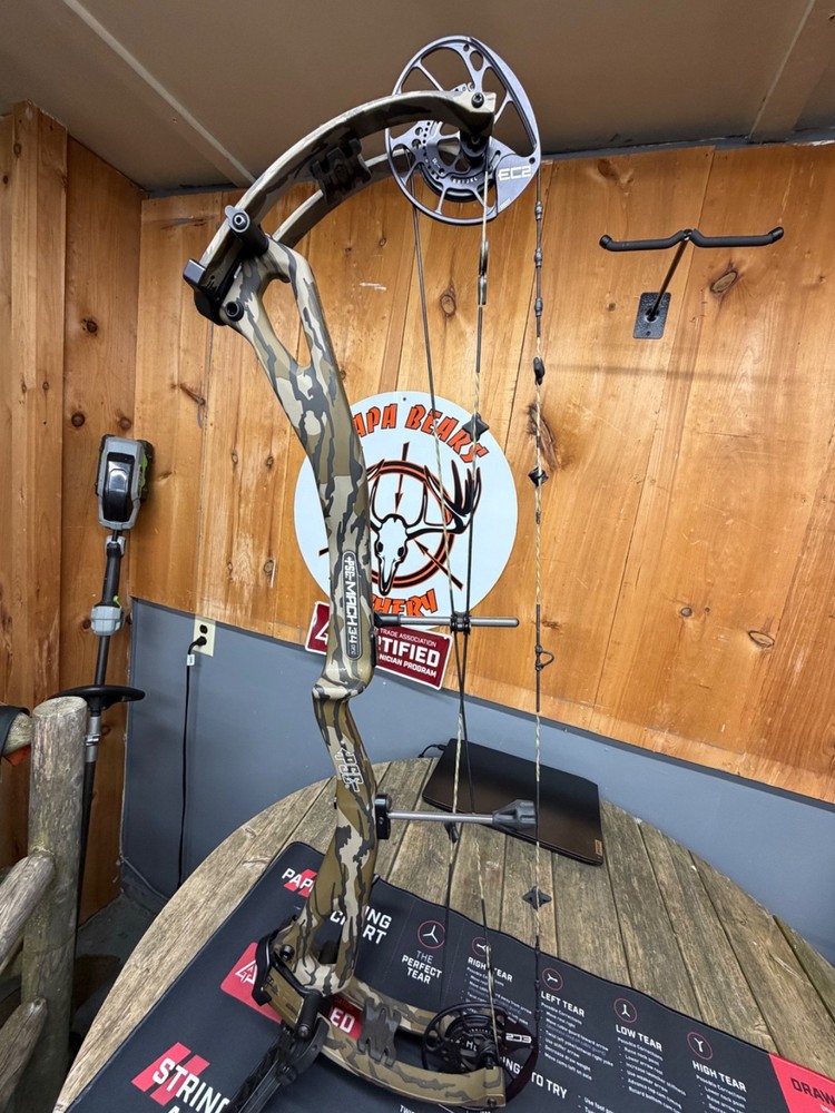 PSE Mach 34 EC2, RH, 26.5-32in DL, 60-70lb DW, Custom Camo, Gas Strings