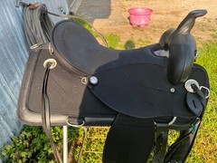 17 ABETTA Light Weight Western Trail Saddle with pad, girth, and stirrups.