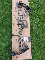 Bowtech Carbon One X RH Custom Order Tan Riser Black Limbs 70# w/Punisher Decals