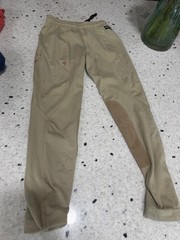 kids riding pants and two tops! Sold as a set. mainly Kerrits brand. Size small