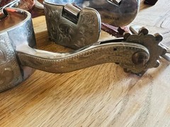 Showman brand Silver Woman’s Spurs fits size 7 boot – used but in good condition