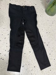 kids riding pants and two tops! Sold as a set. mainly Kerrits brand. Size small