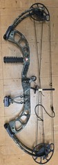 PSE x-force pro series Compound Bow with sight and stabilizer.