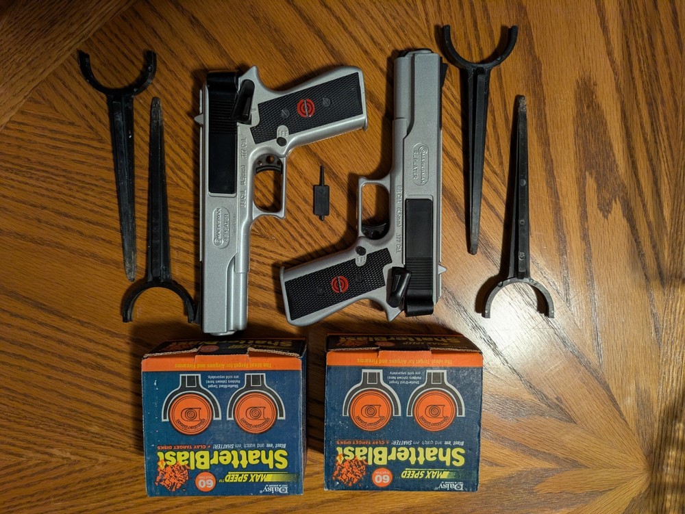 Pair of Marksman .177 Caliber BB/Pellet/Dart Shooter’s Kit Pistols and Discs