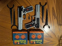 Pair of Marksman .177 Caliber BB/Pellet/Dart Shooter’s Kit Pistols and Discs