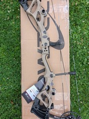 Bowtech Carbon One X RH Custom Order Tan Riser Black Limbs 70# w/Punisher Decals