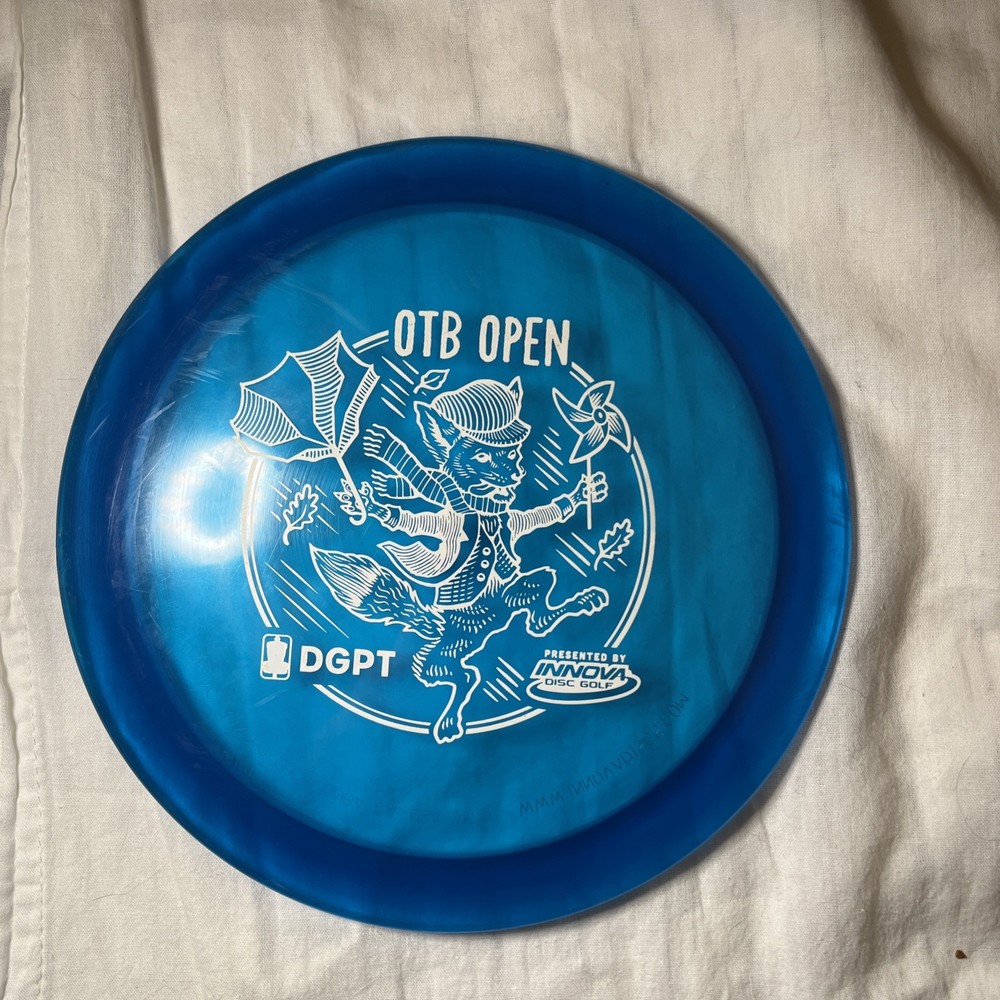 Innova Champion Firebird – OTB Open Stamp – Blue 174g – Used Unmarked