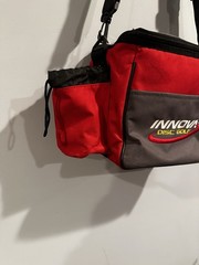 Innova Standard Bag Disc Golf Bag Red Holds 10-12 Discs Water Resistant Pockets