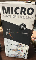 Micro Maxi Deluxe LED Scooter Black/Orange LED Wheels Ages 5-12 NEW OPEN BOX