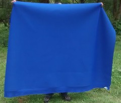 Neoprene Sponge Rubber and Nylon 4 way stretch fabric on both sides 5mm thick.