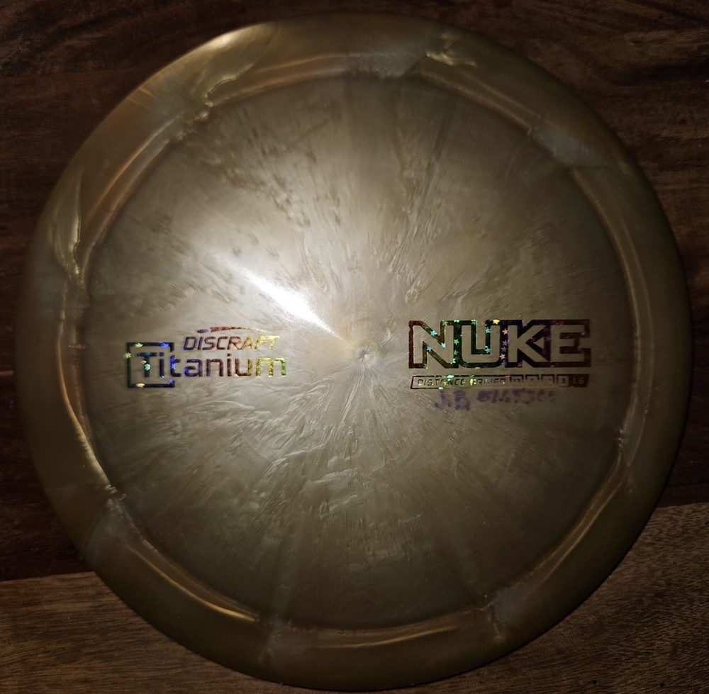 Discraft Titanium Nuke Distance Driver Golden Swirl Rainbow Star 175g