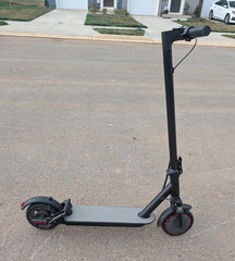 Foldable e-scooter for adults under 275 pounds, less than 1 month old.