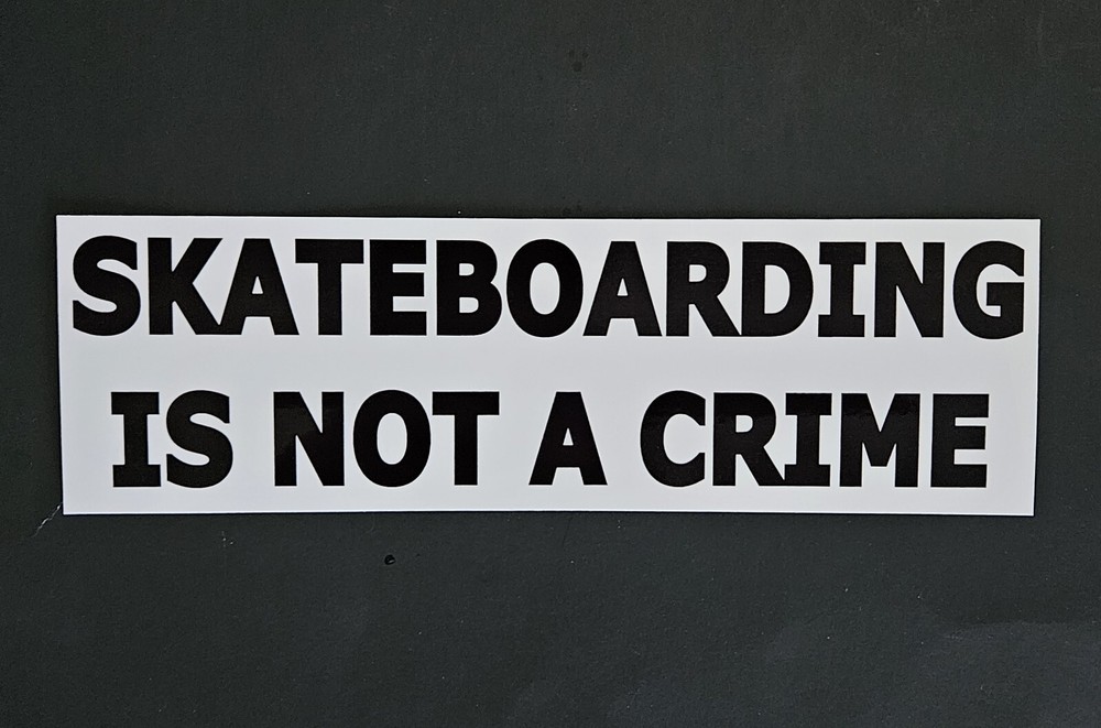 Free Same Day Shipping Classic SKATEBOARDING IS NOT A CRIME Sticker 8.5 x 2.25
