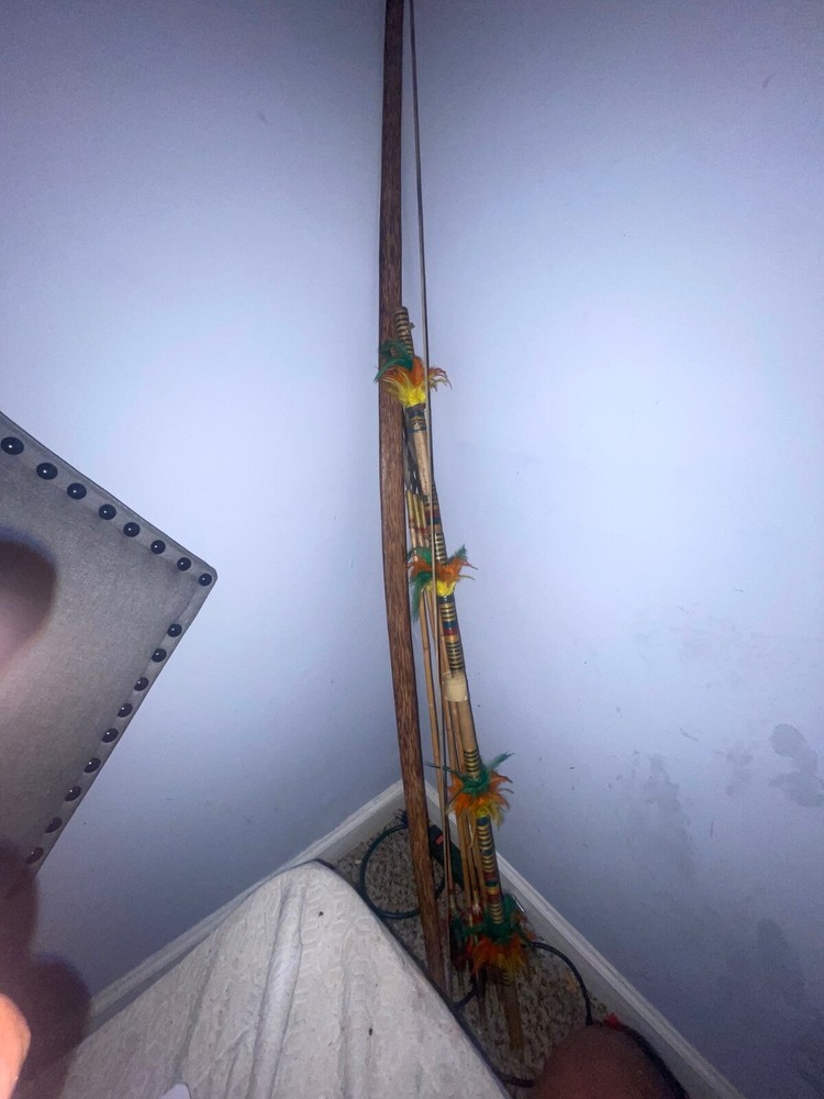 authentic bow and arrows from a tribe in the mountains of the Philippines