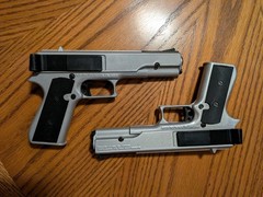 Pair of Marksman .177 Caliber BB/Pellet/Dart Shooter’s Kit Pistols and Discs