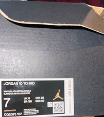brand new item in your image is a pair of Air Jordan 10 TD Mid Football Cleats