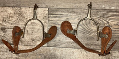 2 1/2 WESTERN SPURS WITH LEATHER STRAPS , SPINNING ROWELS