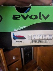 Red/white/blue Ashima evolve climbing shoes