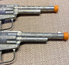 VINTAGE 1950s PAIR OF SINGLE SHOT CAP GUNS WITH CARDBOARD HOLSTERS UNMARKED