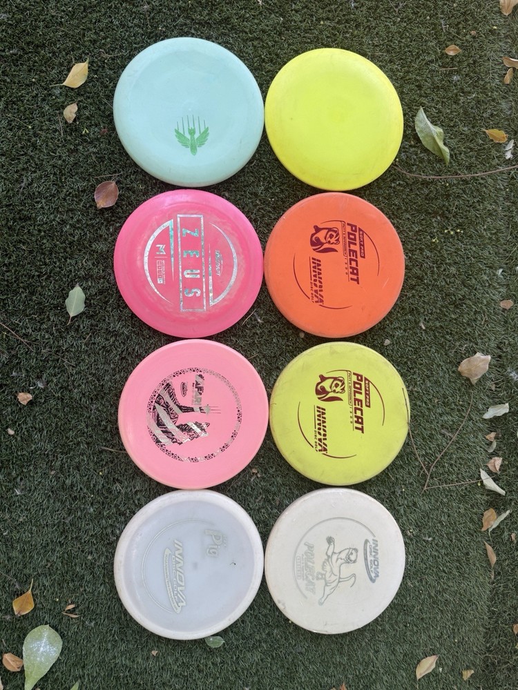 8 random disc golf discs