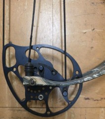 PSE x-force pro series Compound Bow with sight and stabilizer.