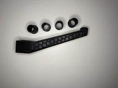 Headrest bow hanger with rubber insert