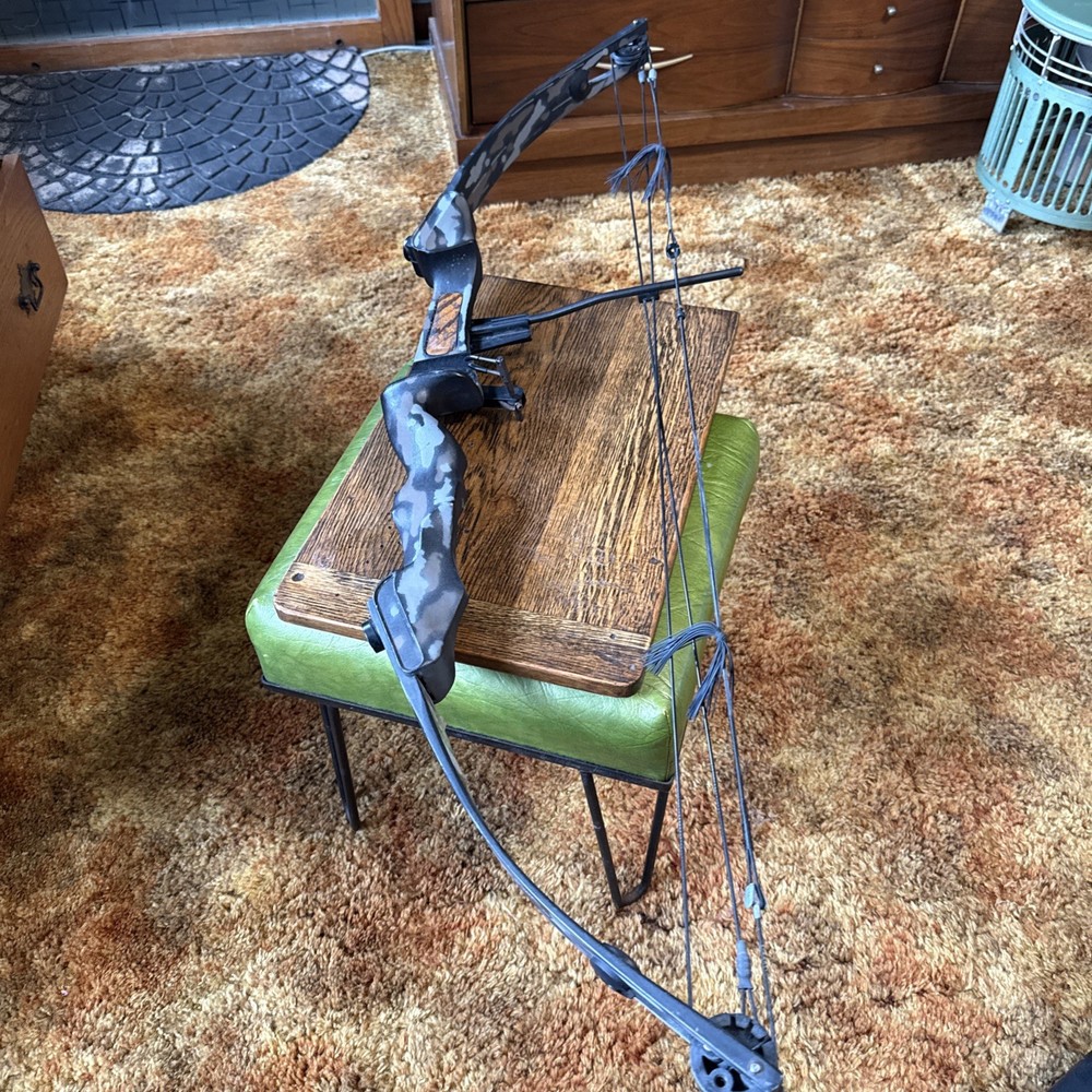 Vintage Martin Tiger Compound Bow, 50 pound draw weight, 27″ draw length, camo