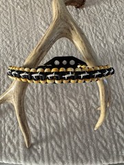 Black, Yellow And White Bow Wrist Sling