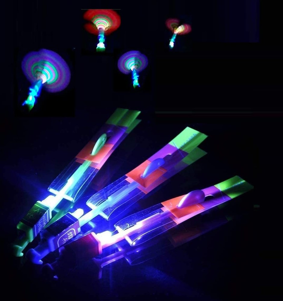 Cool LED Light Up Helicopters (Multicolored) Slingshot Style Flying Toy Arrow…