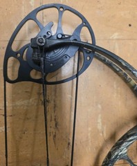PSE x-force pro series Compound Bow with sight and stabilizer.