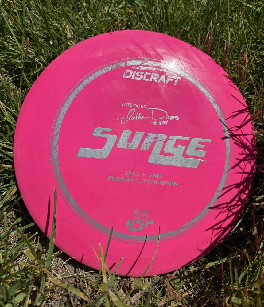 Discraft Surge Distance Driver Pink Premium Plastic 11/5/-1/3 Enhanced Grip
