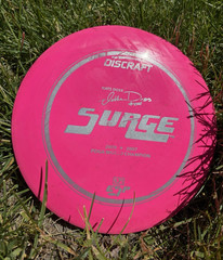 Discraft Surge Distance Driver Pink Premium Plastic 11/5/-1/3 Enhanced Grip