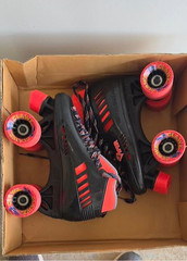 pacer roller skates, new in box. Top of box says Roller Derby, universal size