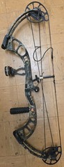 PSE x-force pro series Compound Bow with sight and stabilizer.