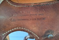 Simco Western saddle and stand