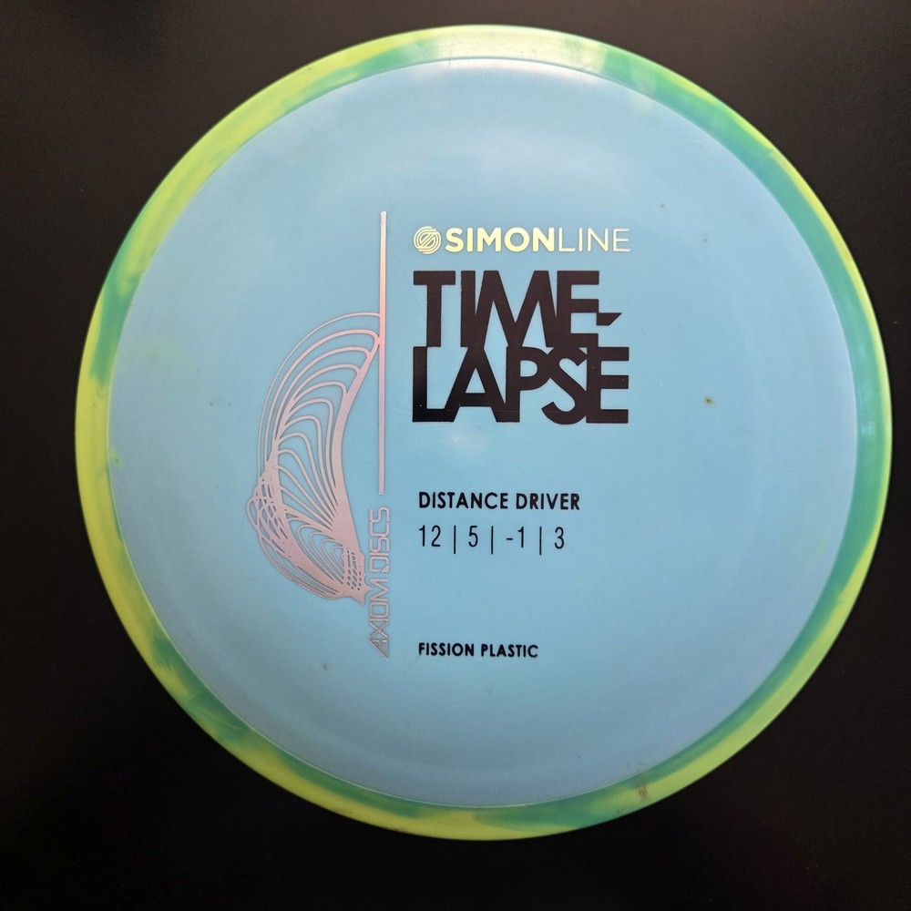 Axiom Fission Timelapse Blue Plate, Teal/Green Swirl Rim 167 grams