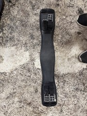 Used black Ovation Dressage girth 24″